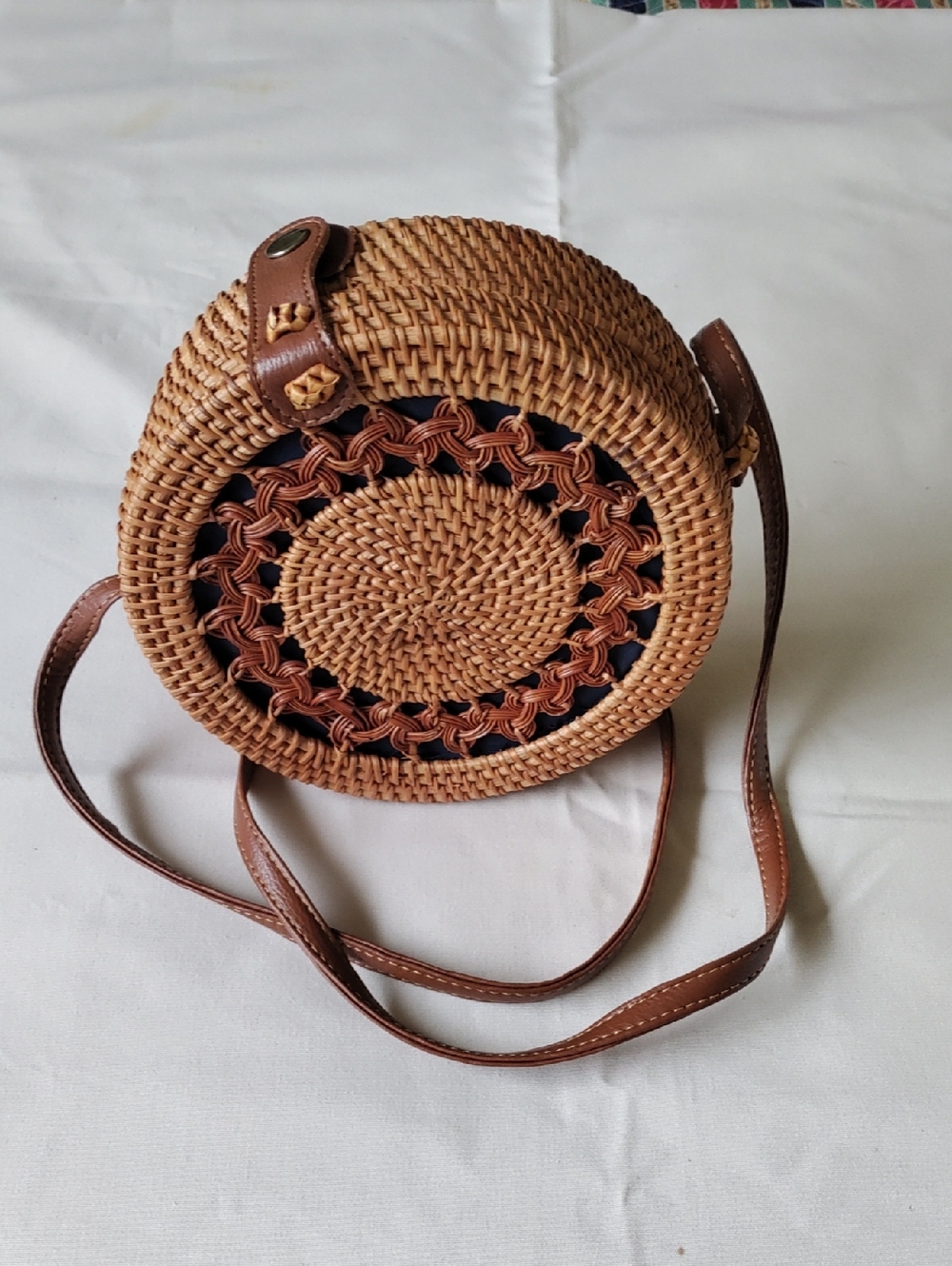 Woven Round Crossbody Bag with Brown Trim